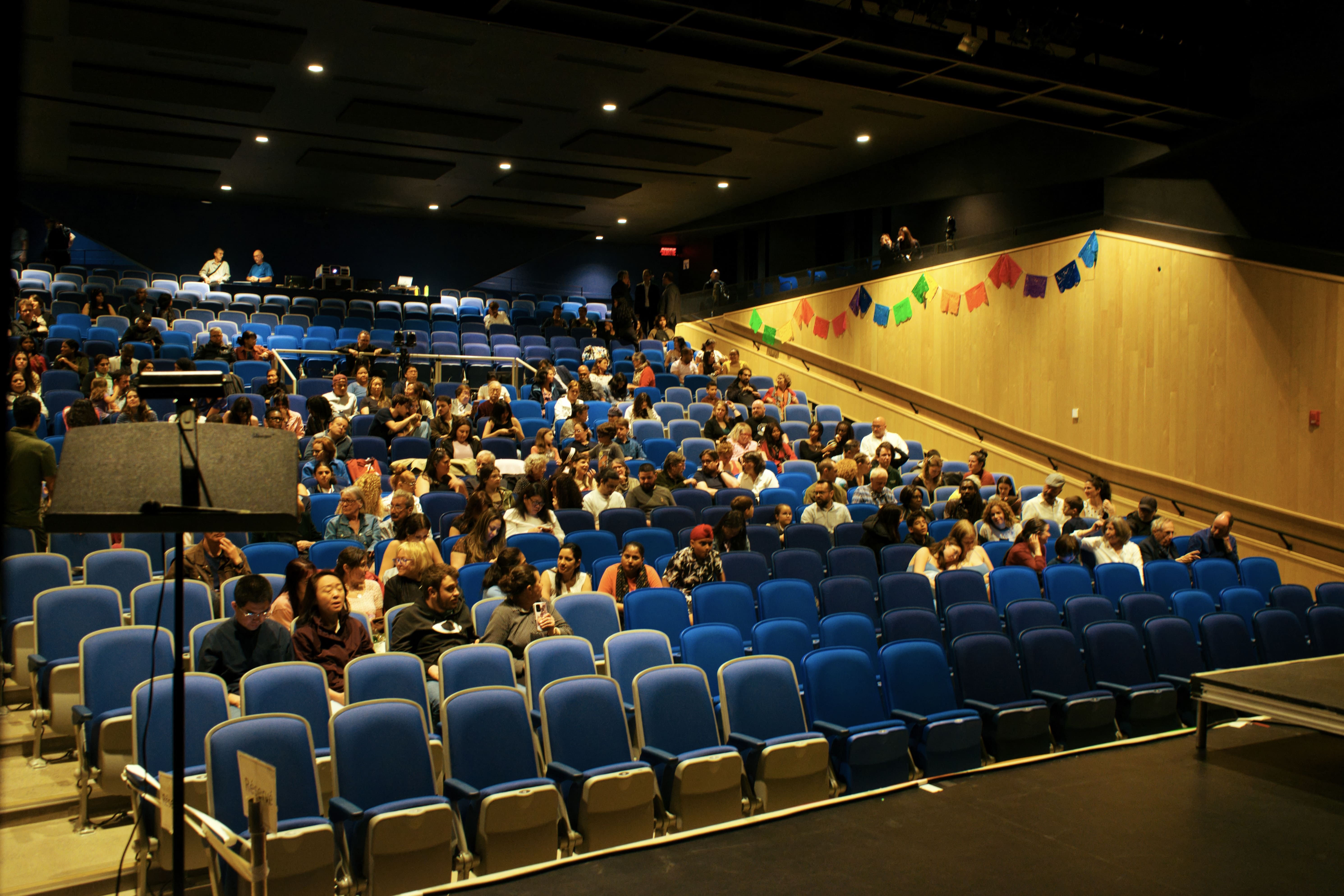 Audience seated in an auditorium